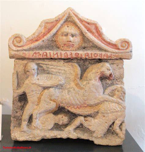 urne etrusche con figure umane